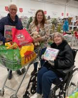 Liz and David donating toys